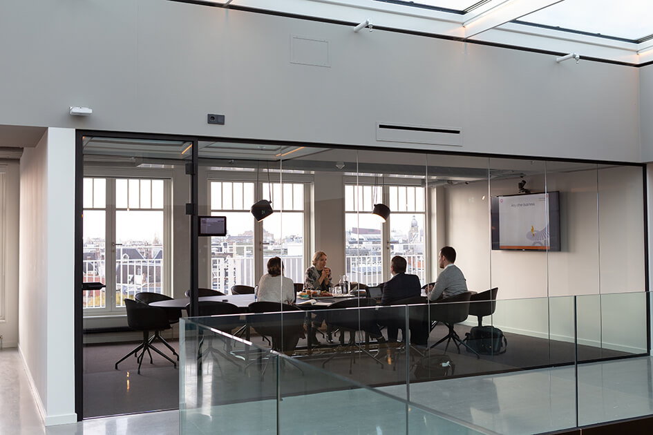 Coworkers sitting at conference table